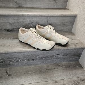 Vintage Diesel Evelyn sneakers in cream and beige leather with suede accents. 